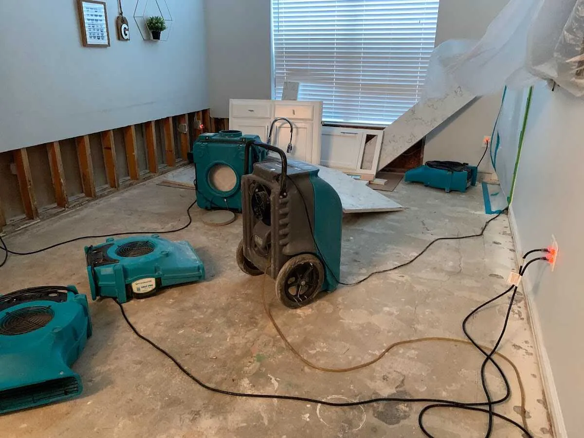 Dehumidifier in flood-cut room for Water Extraction & Removal in Cave Springs